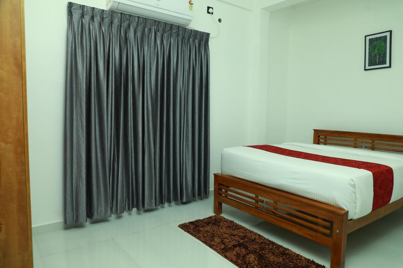 Achoos Residency Hotel Tiruvalla Exterior photo